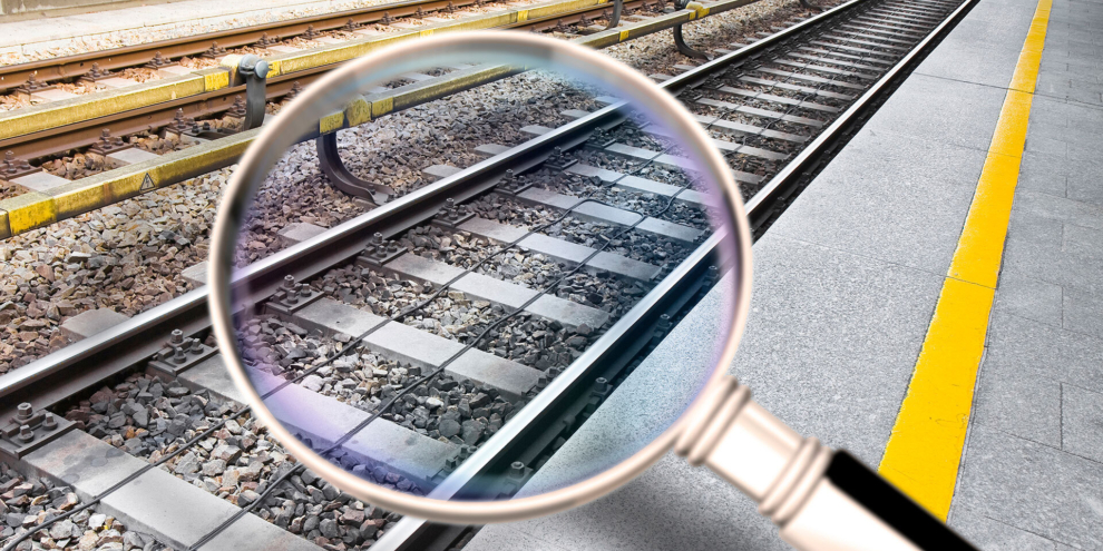 Magnifying glass on rail